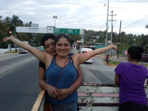 Lili -pictured with Uriel- demonstrating how I feel riding in the truck