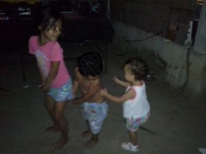 Wild children of Oaxaca: Lucia and her cousins having unstructured playtime!  Yes, they are riding a horse (broom) together