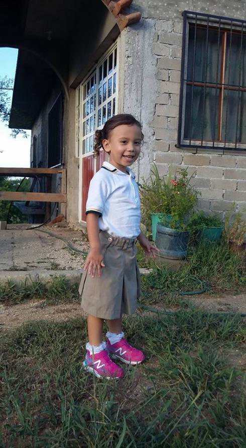 Her little uniform...(yes, a white shirt for small children. sigh)